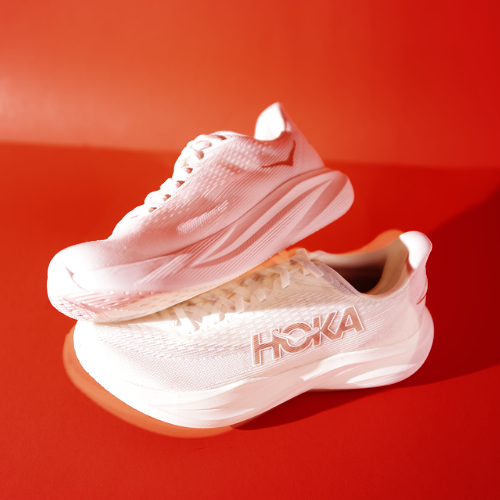 square image of hoka shoe  on red background